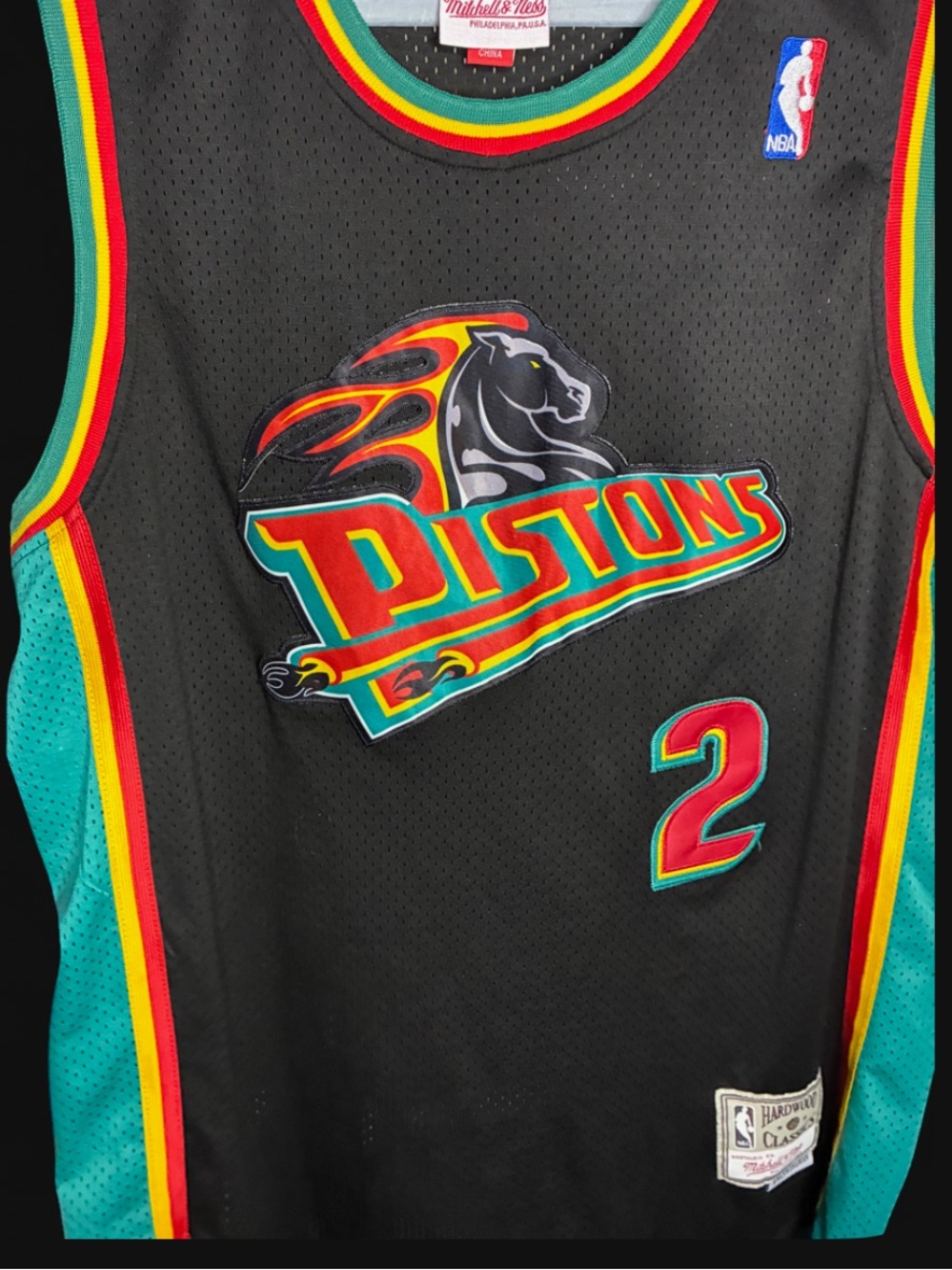 Mitchell & Ness Kids Detroit Pistons Jersey Black with Teal, Red & Yellow Trim